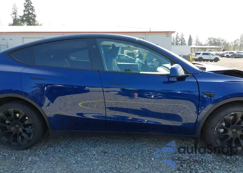 2023 Tesla Model Y Awd/Long Range Dual Motor All-Wheel Drive из США, поврежденный, VIN 7SAYGDEE6PF838025